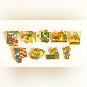 ATLANTA'S 1996 OLYMPIC MASCOT IZZY COLLECTORS PINS SET OF 9